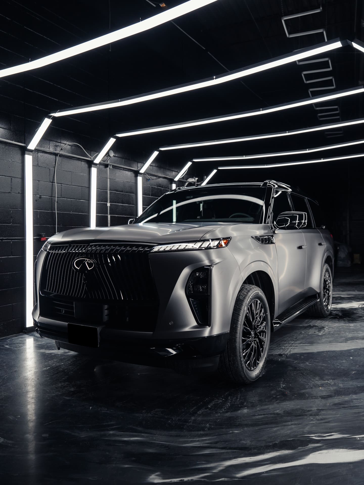 Wraptors tinted Infiniti QX80, front