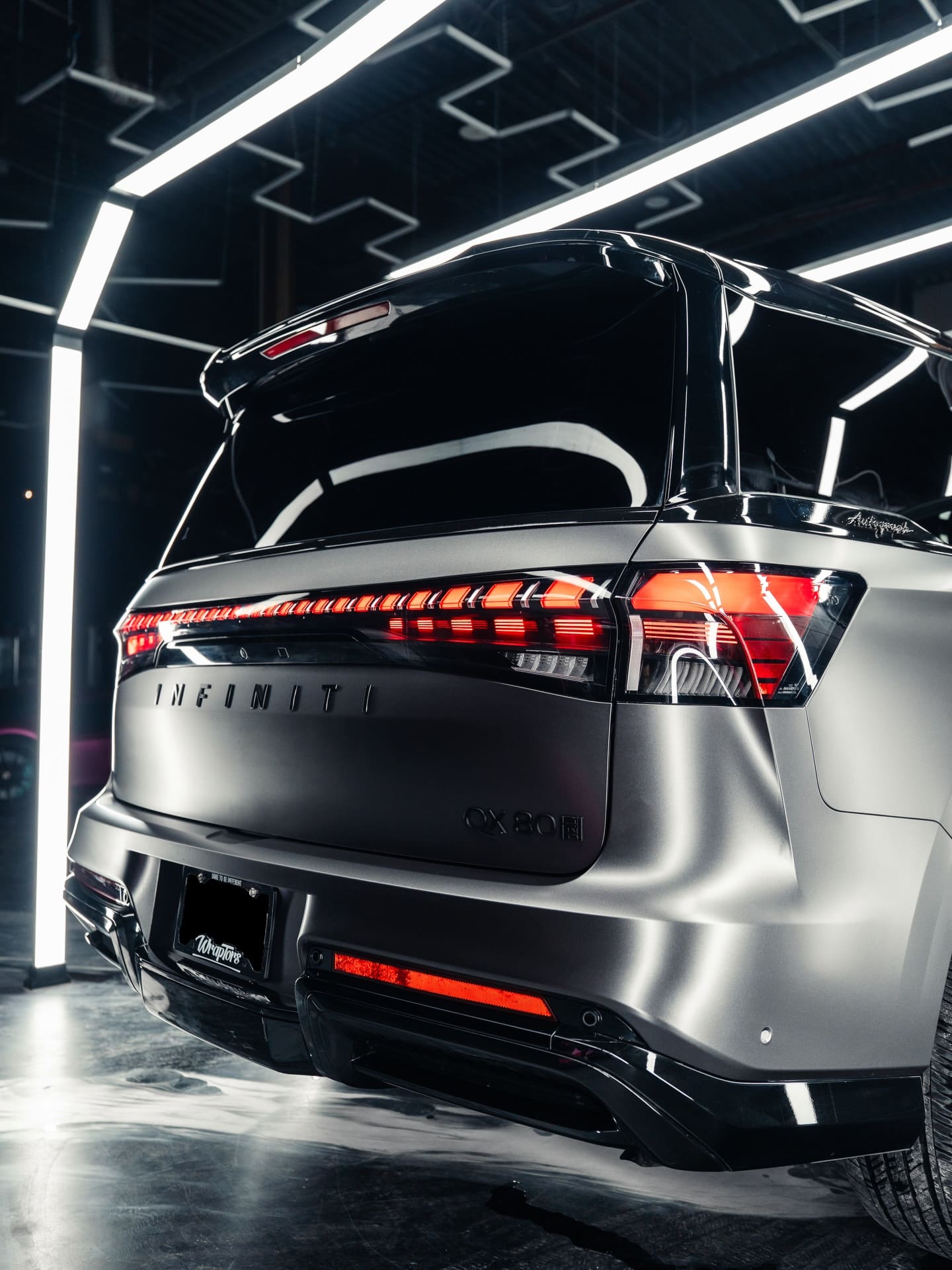 Wraptors tinted Infiniti QX80, rear