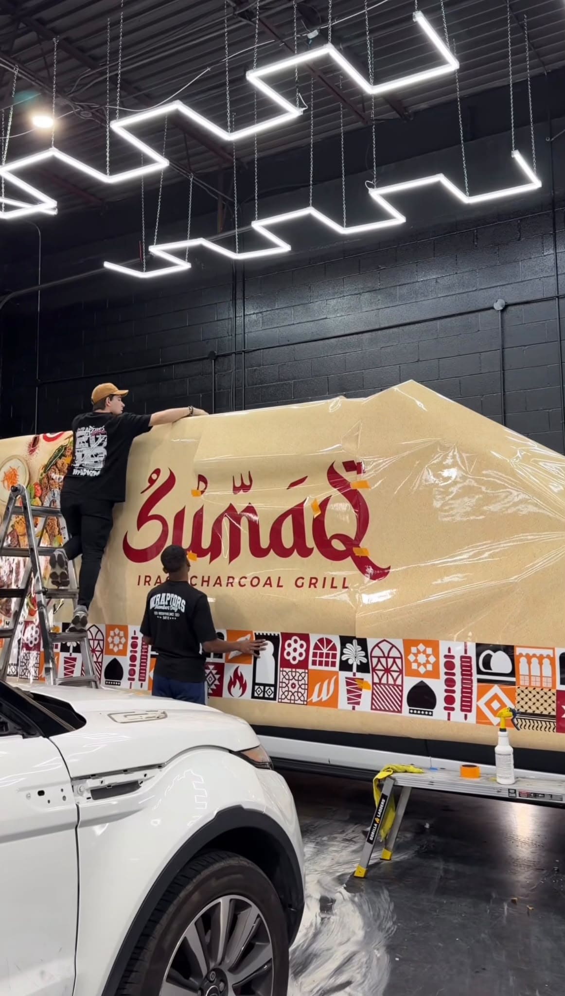 Wraptors commercial wrap installation in progress